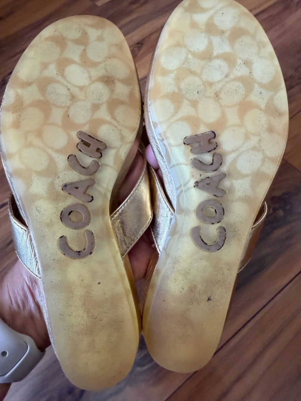 COACH Metallic Gold Leather Tassel Toe-Post Sandals - Picture 5 of 9